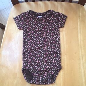 Like new! Brown onesie with flower detail